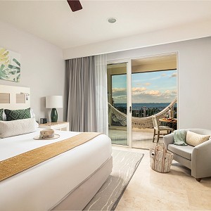 king size bed suite with ocean view
